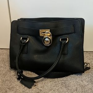 Black Michael Kors purse approximately 12in